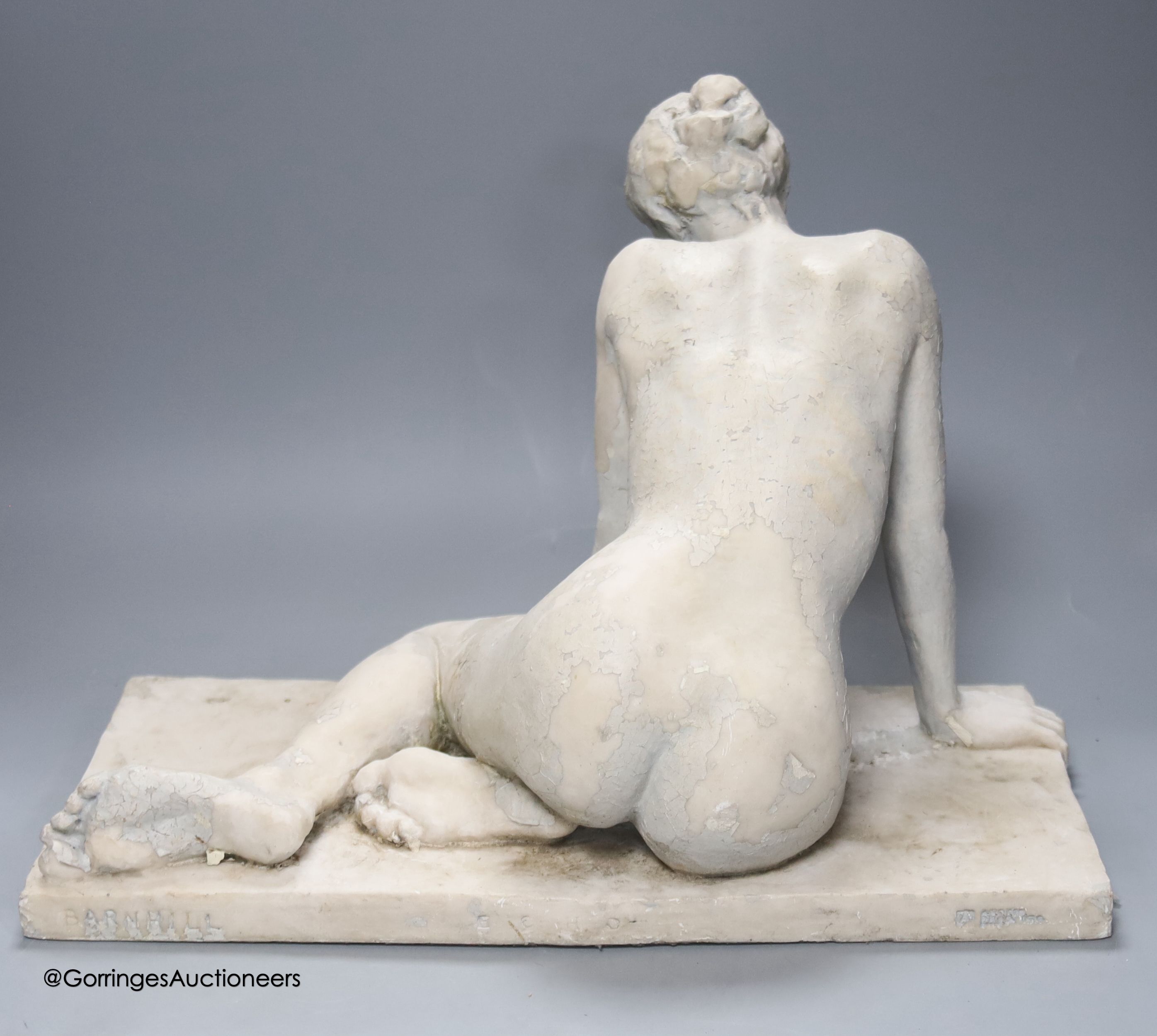 A composite figure of a seated nude, width 44cm height 32cm